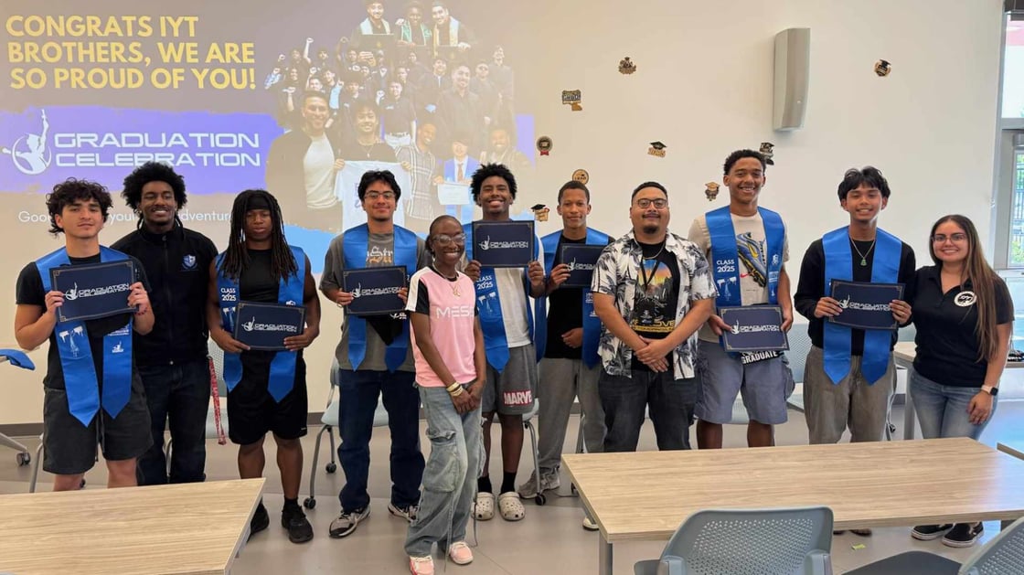 Seniors who graduated from Mira Loma High School pose with IYT program staff (Left to right: David Archuleta, Mentor Jay Williams, Christopher Borders, Vincent Joaquin, Mentor Aniqua Anderson, Alijah Kilgore, Donald Lett Jr, Program Manager Pete Guerrero, Naeem Parker, Jacob Nguyen, and Alexa Cendejas. Simon Tokailagi and John Ramirez not pictured.